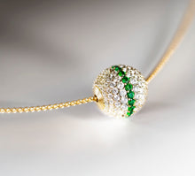 Load image into Gallery viewer, Radiant Gold Sphere Necklace&lt;br&gt;w/White Pavé Diamonds&lt;br&gt;&amp; Emerald Accent
