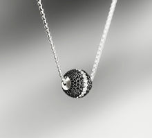 Load image into Gallery viewer, Radiant Silver Sphere Necklace&lt;br&gt;w/Black Pavé Diamonds&lt;br&gt;&amp; White Diamond Accent
