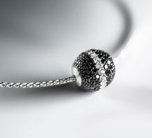 Load image into Gallery viewer, Radiant Silver Sphere Necklace&lt;br&gt;w/Black Pavé Diamonds&lt;br&gt;&amp; White Diamond Accent
